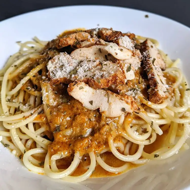 Tom Yam Pasta with Grilled Chicken Breast by weplaygames cafe in tamarind square cyberjaya