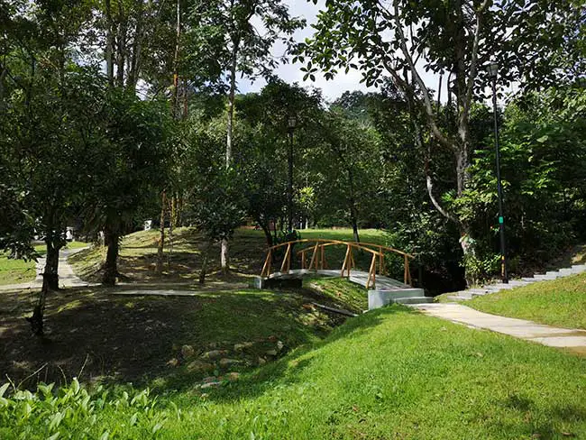 a small bridge connecting to other parts of the park in taman rimba bukit kerinchi