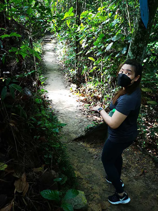 valerie looking back from the jungle trails of the hike