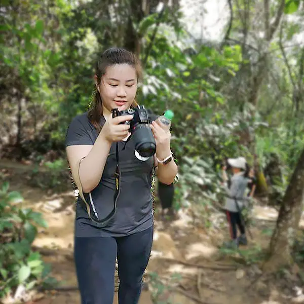 valerie the malaysia blogger taking photo while hiking
