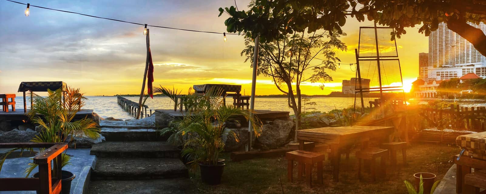 cafe in melaka with a stunning ocean view