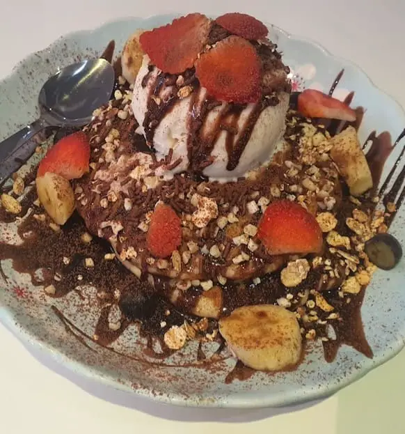 messy ice cream dessert from Eggxtra Cafe