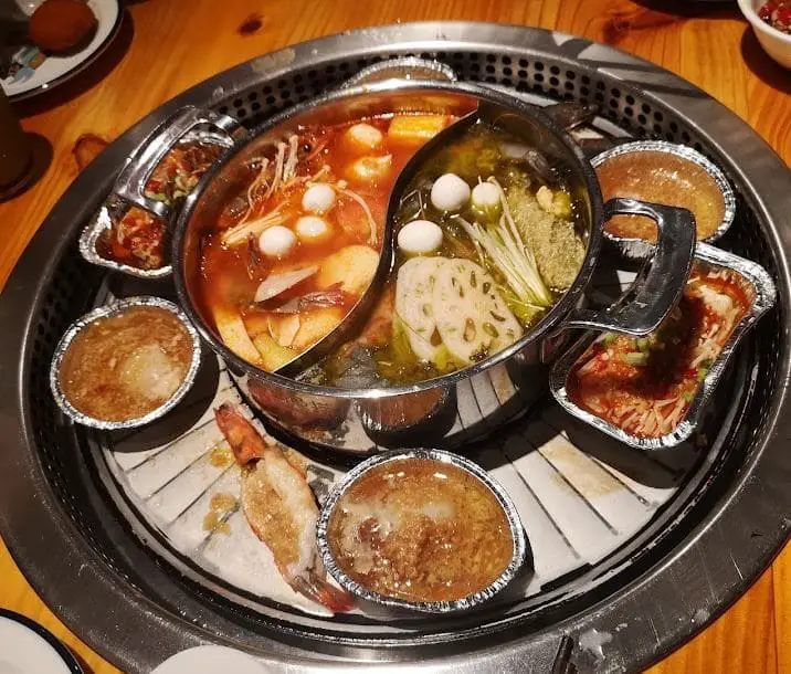 all the ingredients in this majestic hotpot in ai shang fish