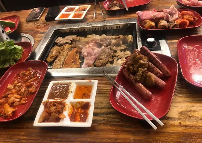 food grilling up in korean fusion bbq located in bugis