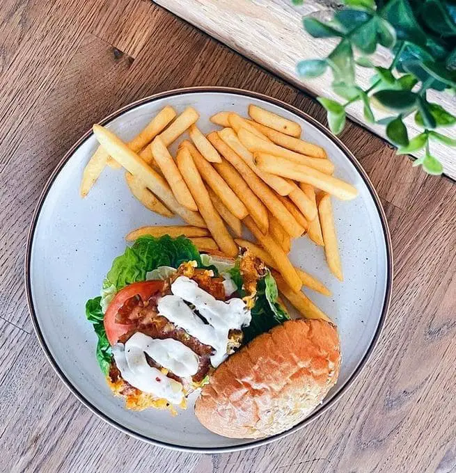 fried fish burger served in sun ray dog cafe singapore