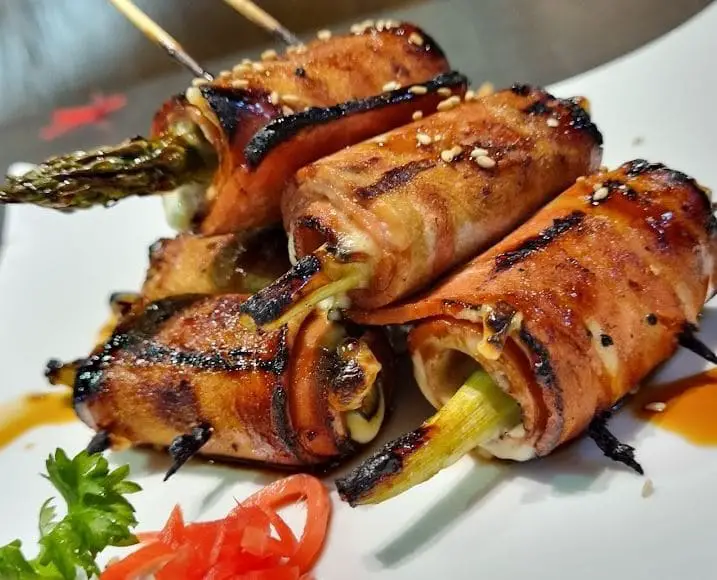 grilled fake meat asparagus in herbivore restaurant