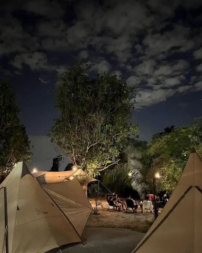 hanging by the firecamp at night