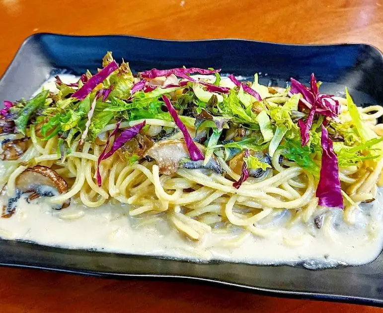 signature pasta dish of blooming sprouts vegetarian restaurant in bugis