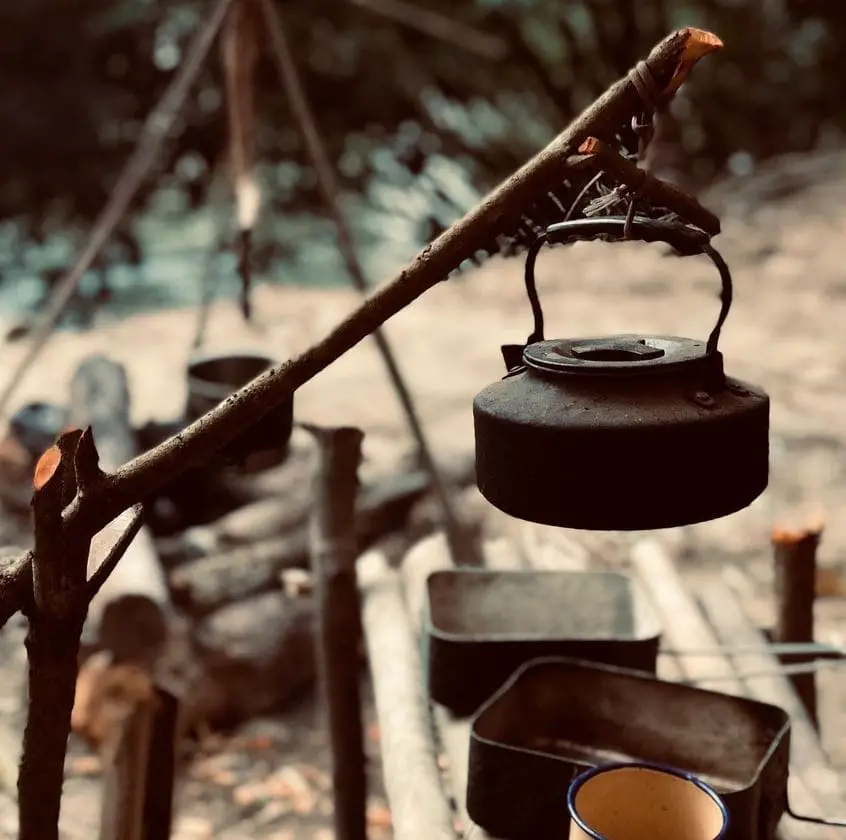 water pot hanging by the stick