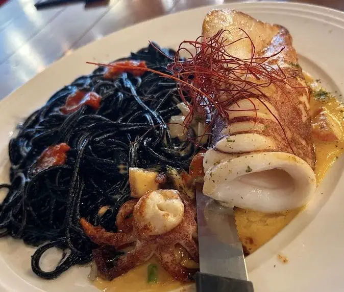 creamy miso squid with squid ink pasta in miam miam japanese food restaurant bugis