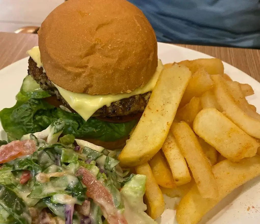 extreme burger salad and fries for breakfast at amsterdam cafe in cameron highland