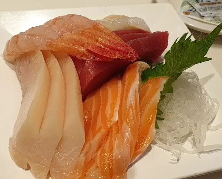 fresh sashimi platter in genki sushi located in bugis