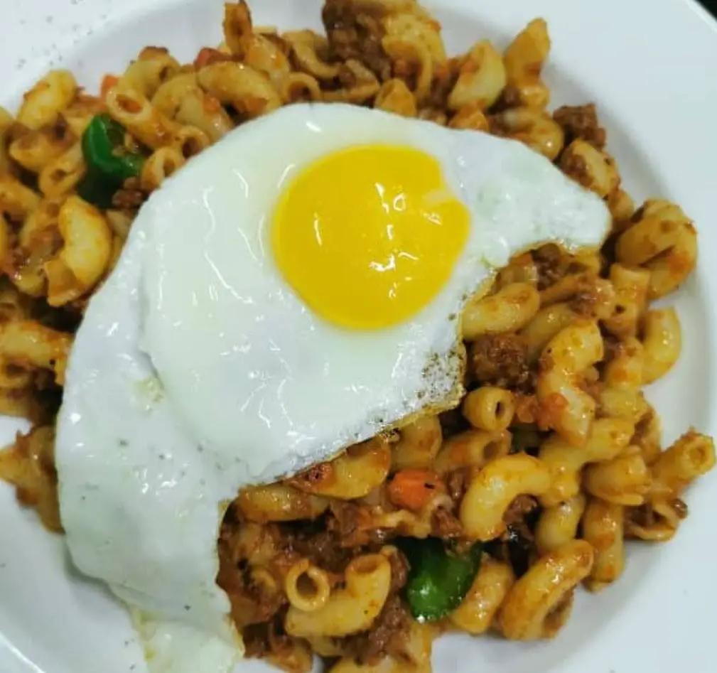 fried egg pasta for breakfast at amsterdam cafe