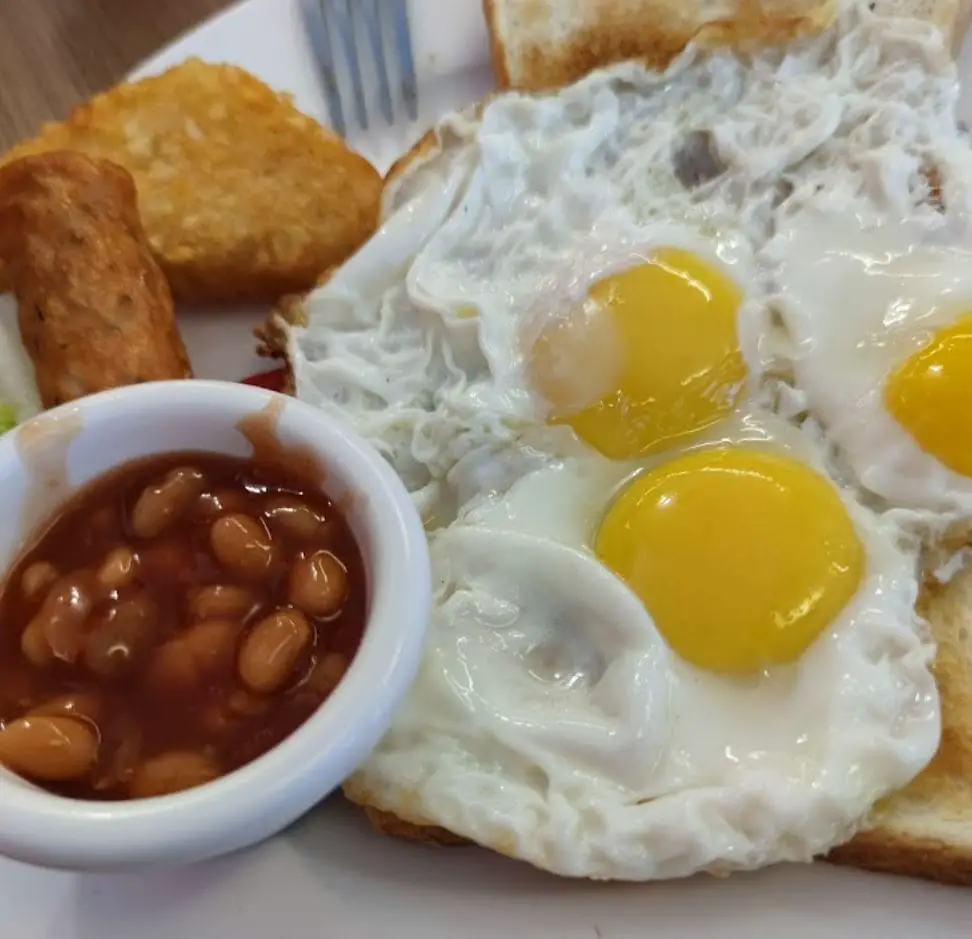triple egg breakfast and toast at amsterdam cafe cameron highlands