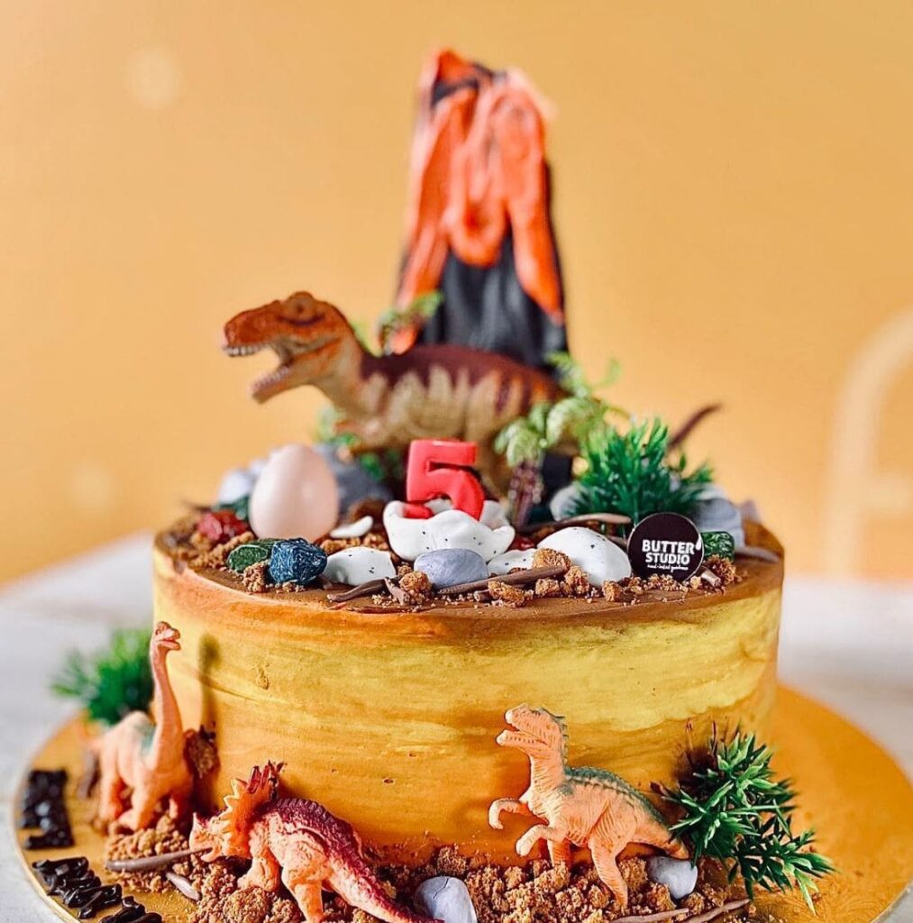 dinosaur cake by a creative bugis cake shop called butter studio