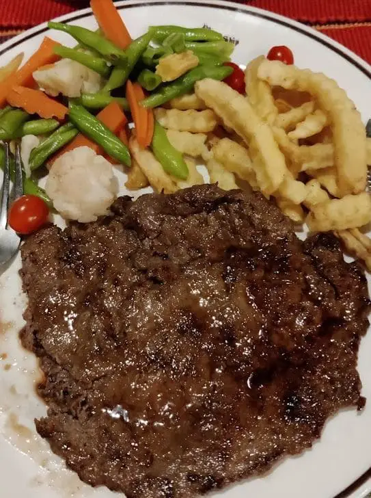 wholesome greens fries and steak western food offered by the ship in penang