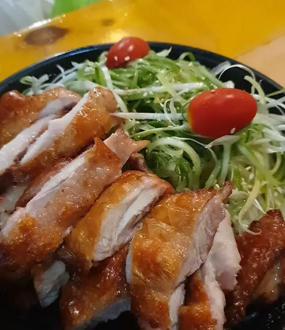beautifully cooked chicken with salad at oven and fried chicken