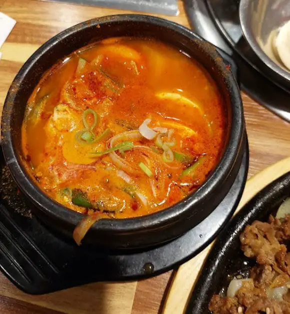 kimchi stew and stir fried meat at wang dae bak pocha korean street bar