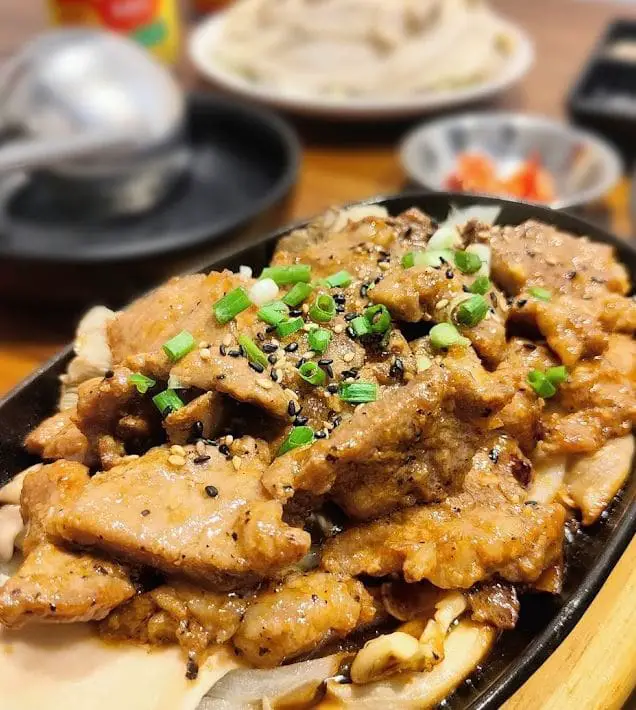 meat on a hot plate at mimi korean bbq restaurant