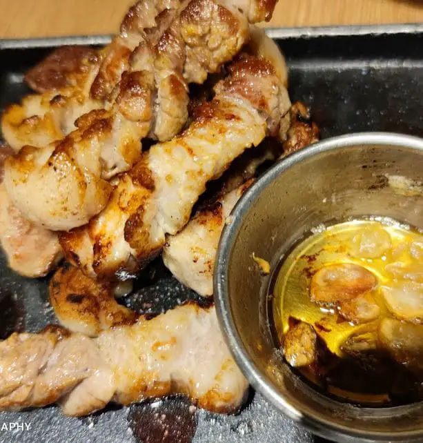 tasty grilled pork with garlic oil at o bba bbq korean restaurant