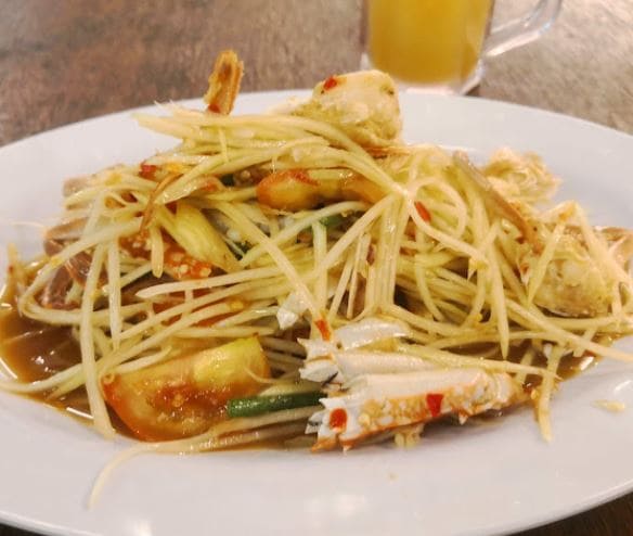 thai mango salad is one of the most popular thai food penang served in Tao Kae Noi caffe