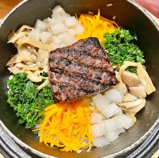 thick steak in a bowl at naeum korean restaurant