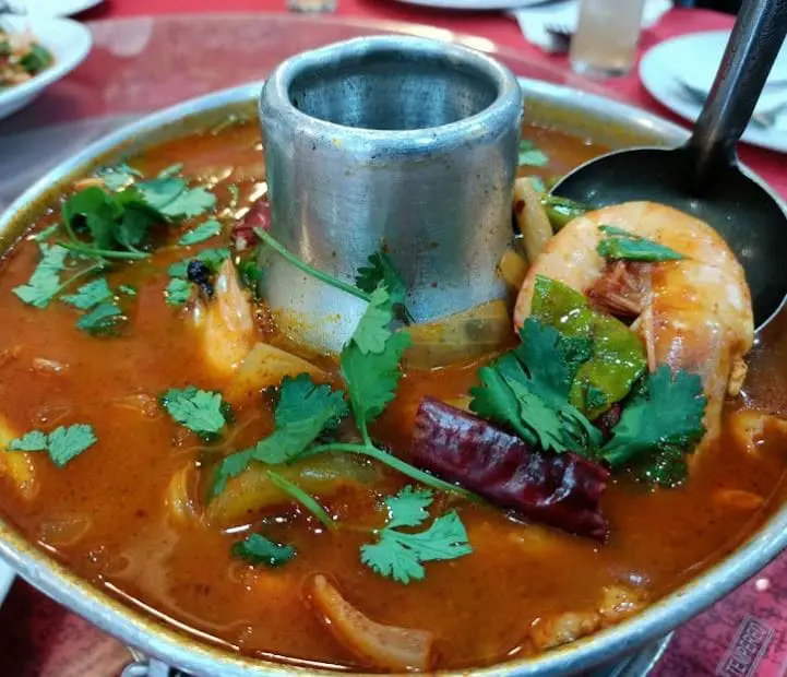 tom yam soup in a hot pot served at cherry blossom thai food penang