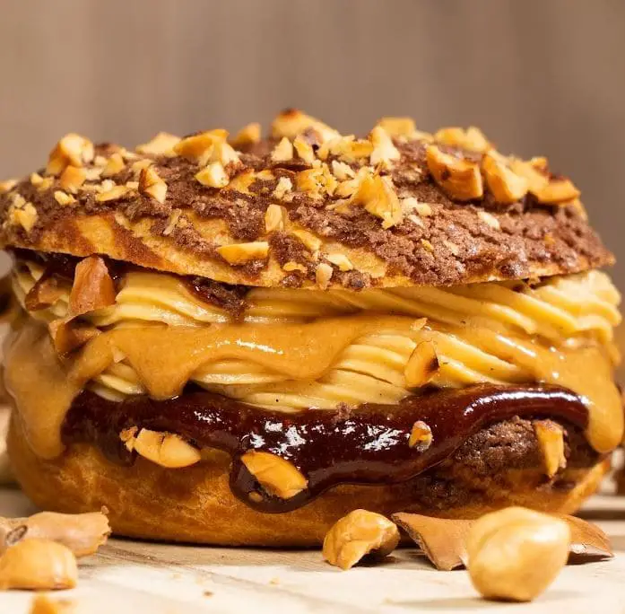 bagel cut with nuts chocolate and cream at alice boulangerie