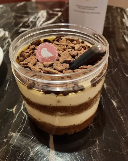 layered tiramisu on the table of nesuto