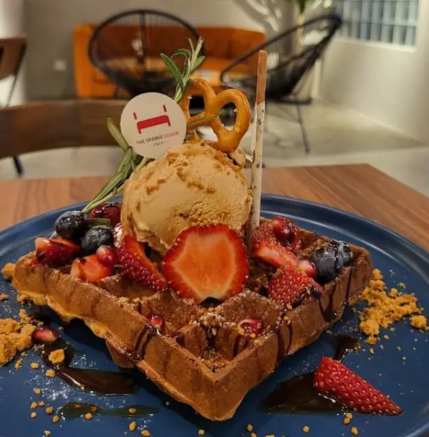 waffle ice cream and fruits at The Orange Couch Cafe