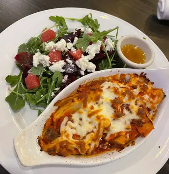 bolognese and caprese salad from Capri Family Restaurant in hamilton district