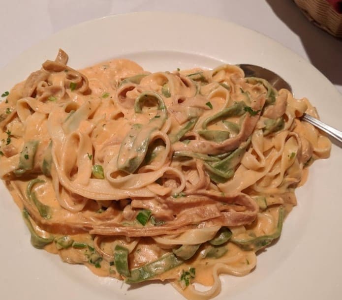 green pasta from Il Paesano Pizzeria & Restaurant