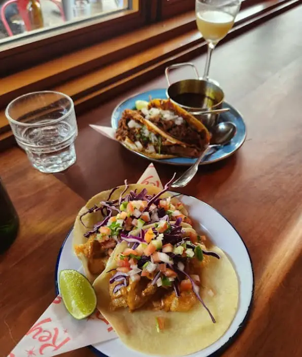 mexican food at a bar seat in El Rey Mezcal Bar toronto