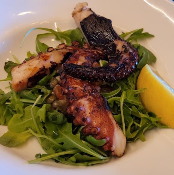 octopus leg served at italian restaurant Eden Trattoria