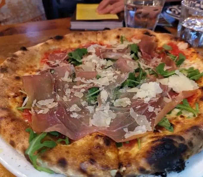 pizza with ham and salt Trattoria Mercatto