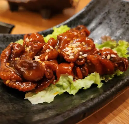 squid with sesame from Kura Japanese Restaurant