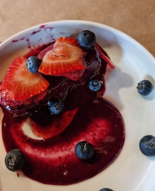 strawberry and blueberry dessert served at El Nahual Tacos