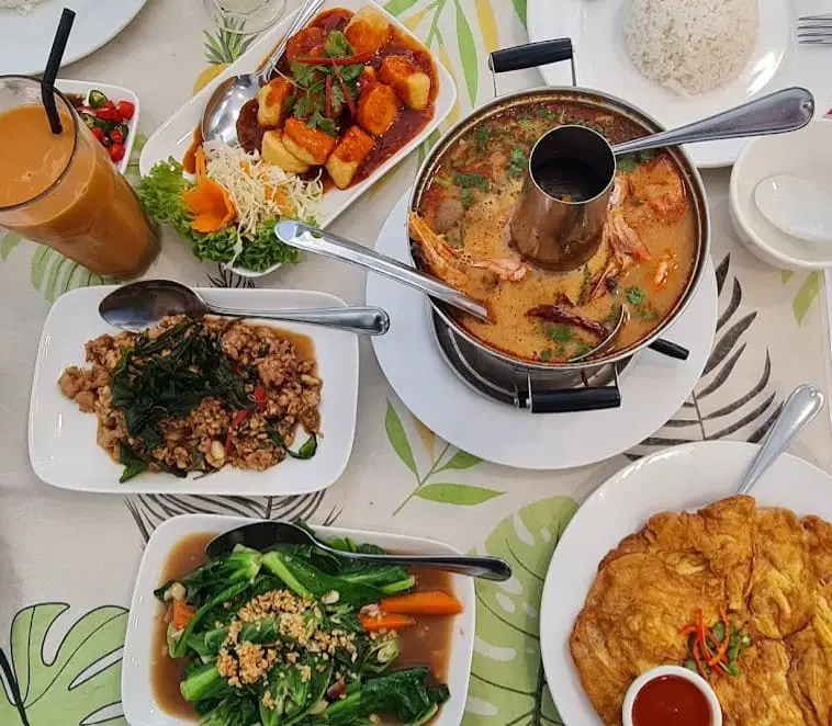 thai dishes on a table at siam Eatery House