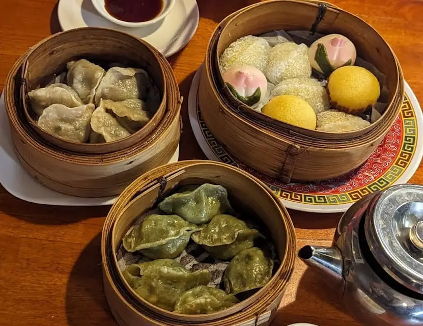 trays of Mother's Dumplings dim sum on the table