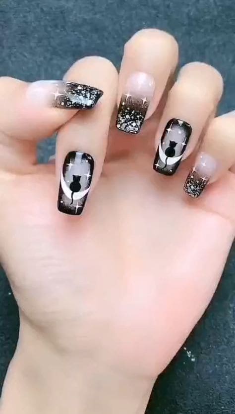 cat by the moon nail design