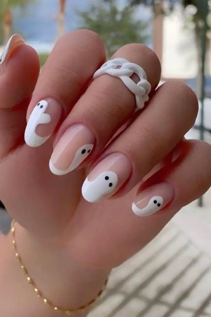creamy white ghost on pink nails
