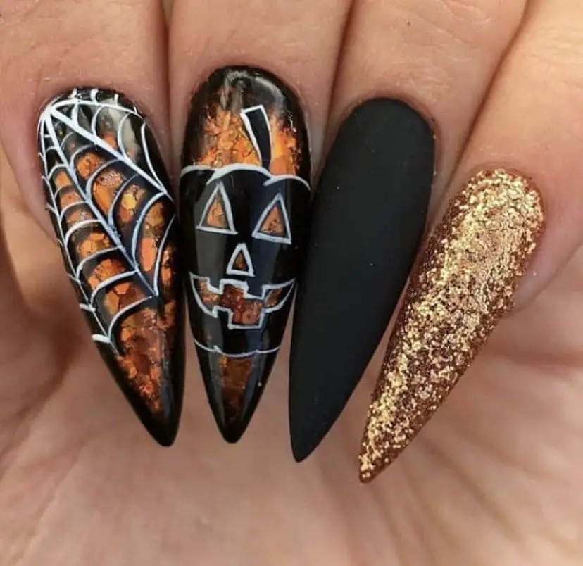 fiery flame of pumpkin and webs halloween nails