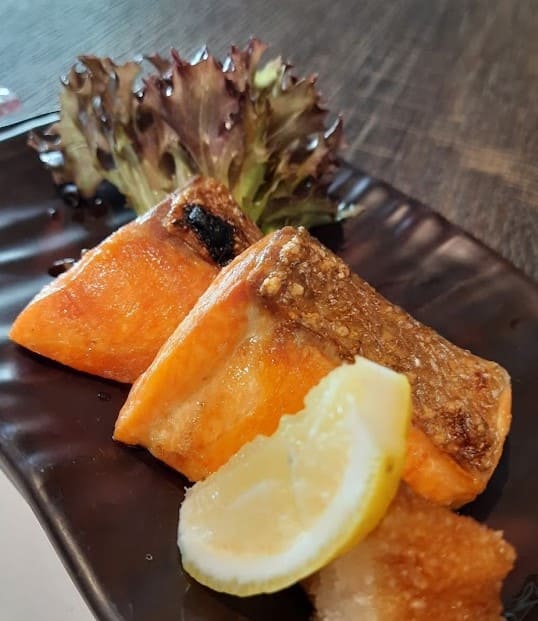 fried salmon served with lemon slice at Nanami japanese restaurant bangsar