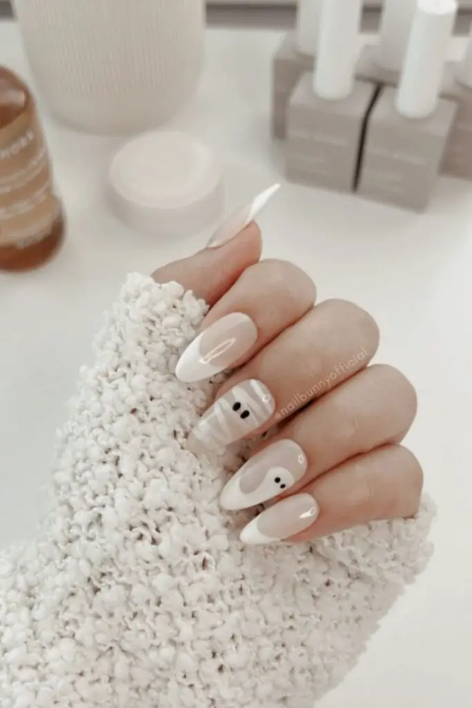 gentle white ghost nail design