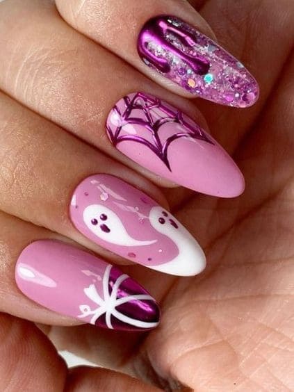ghost on pink nails with glitter
