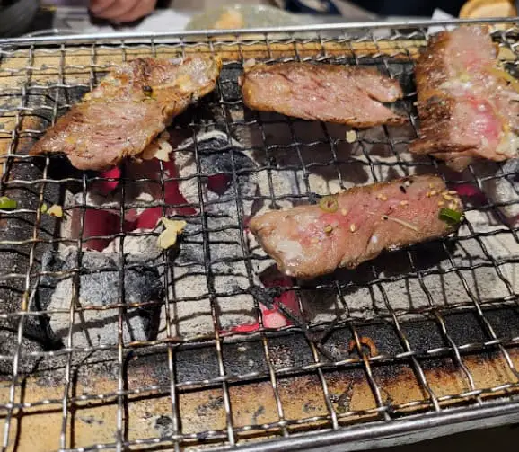 grilling meat at Ushiraku Modern Yakiniku japanese restaurant in bangsar area