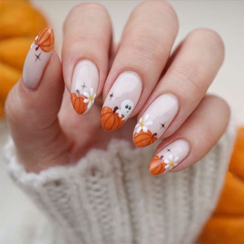pink nail with orange pumpkin tipped nails