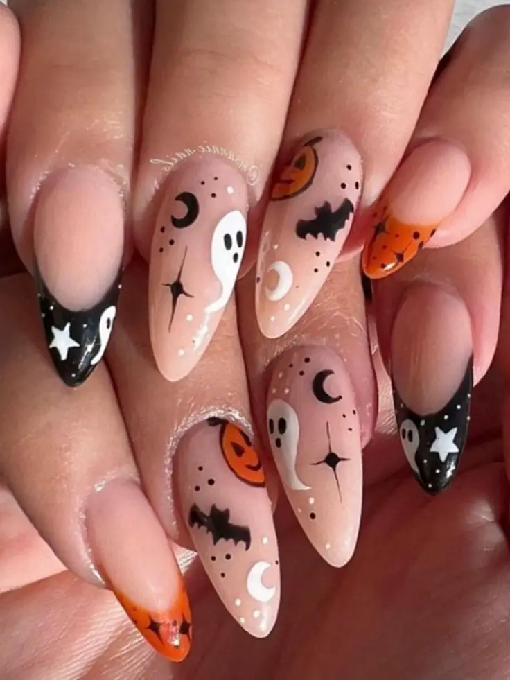 pumpkin and halloween sky on pink nude nails
