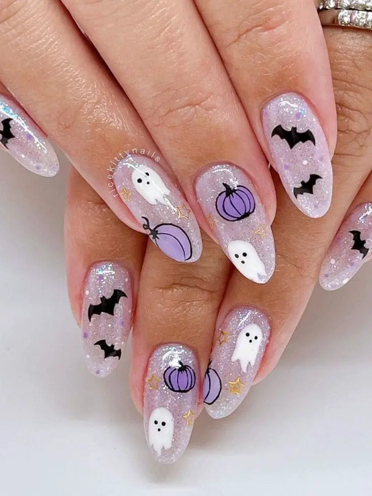 purple ghost and pumpkin nail art