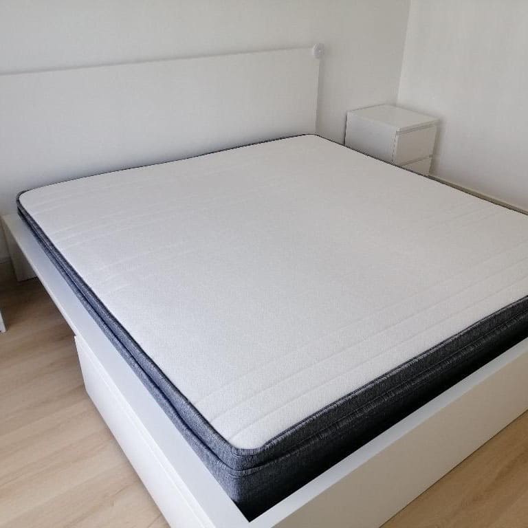 origin mattress on the bed frame